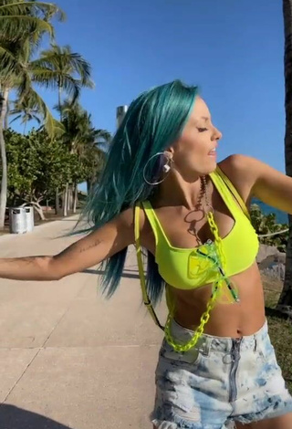 5. Luscious Katie Angel Shows Cleavage in Lime Green Crop Top