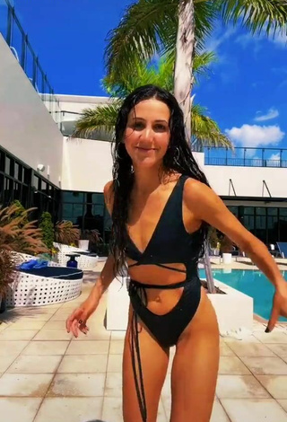 Sultry Kat Stickler in Black Swimsuit at the Pool