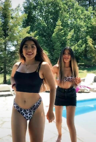 Titillating Melissa & Cassandra Tejada in Bikini Top at the Pool