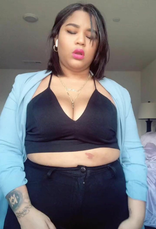 2. Sultry Carol Acosta Shows Cleavage in Black Crop Top