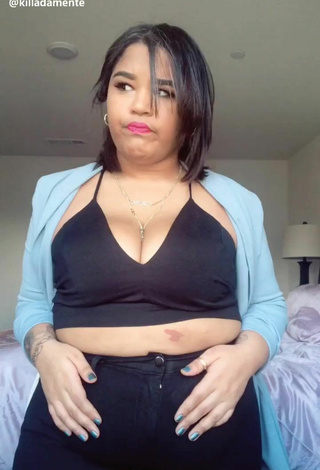 4. Sultry Carol Acosta Shows Cleavage in Black Crop Top