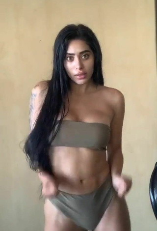 4. Sexy Kim Shantal Shows Cleavage in Olive Bikini