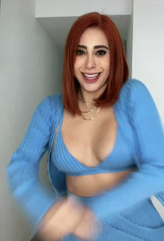 5. Luscious Kim Shantal Shows Cleavage in Blue Crop Top