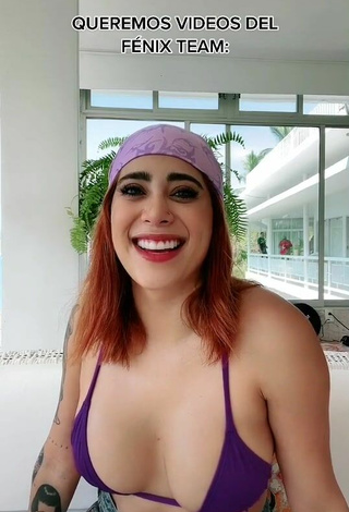 3. Beautiful Kim Shantal Shows Cleavage in Sexy Violet Bikini Top