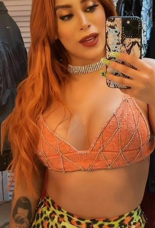 Hottest Kim Shantal Shows Cleavage in Orange Crop Top