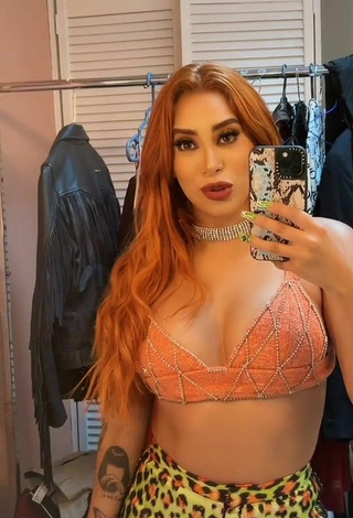 4. Hottest Kim Shantal Shows Cleavage in Orange Crop Top