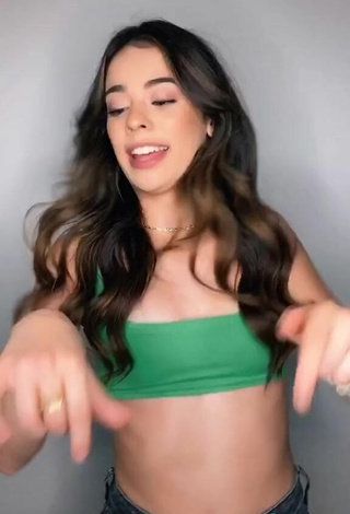 3. Titillating Lauren Kettering in Green Crop Top