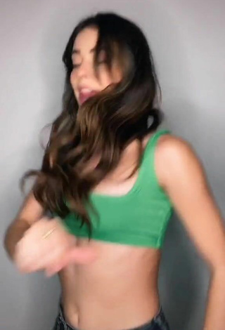 5. Titillating Lauren Kettering in Green Crop Top