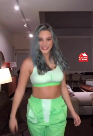 Sultry Lele Pons in Green Sport Bra