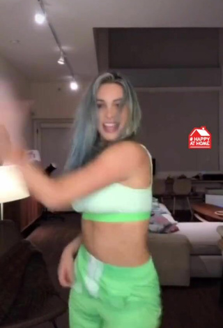 3. Sultry Lele Pons in Green Sport Bra