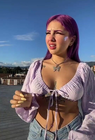 2. Titillating Lilacoloridas in Purple Crop Top