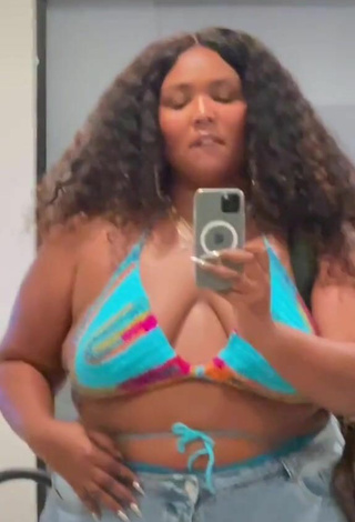 2. Sultry Lizzo Shows Cleavage in Bikini Top