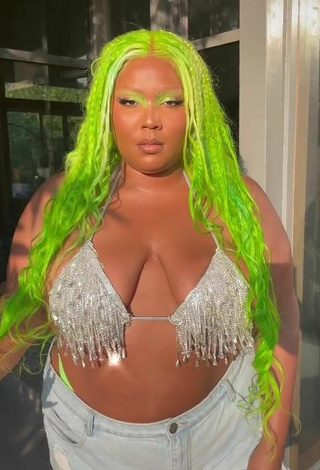 Sexy Lizzo Shows Cleavage in Bikini Top