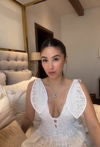 3. Sultry Heart Evangelista Shows Cleavage