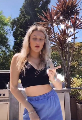 2. Luscious Madi Monroe Shows Cleavage in Black Crop Top