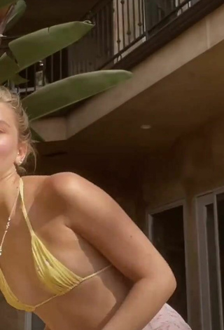 2. Luscious Mads Lewis in Yellow Bikini Top