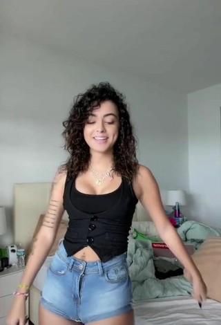 5. Sweetie Malu Trevejo Shows Cleavage in Black Top