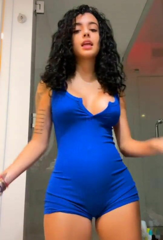 4. Luscious Malu Trevejo Shows Cleavage in Blue Overall