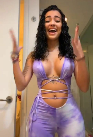 3. Sexy Malu Trevejo Shows Cleavage in Purple Overall