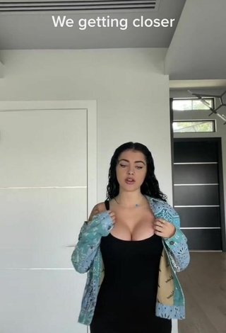 Elegant Malu Trevejo Shows Cleavage