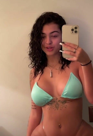 3. Titillating Malu Trevejo Shows Cleavage in Light Green Bikini