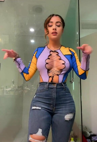 Gorgeous Malu Trevejo Shows Cleavage in Alluring Crop Top