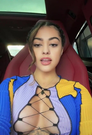 Titillating Malu Trevejo Shows Cleavage in Crop Top