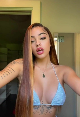 3. Erotic Malu Trevejo Shows Cleavage in Blue Bikini Top