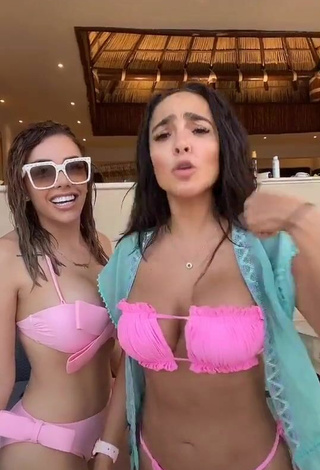 Titillating Manelyk González Shows Cleavage in Pink Bikini