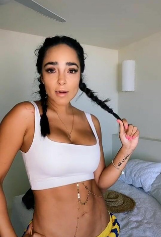 Beautiful Manelyk González Shows Cleavage in Sexy White Crop Top