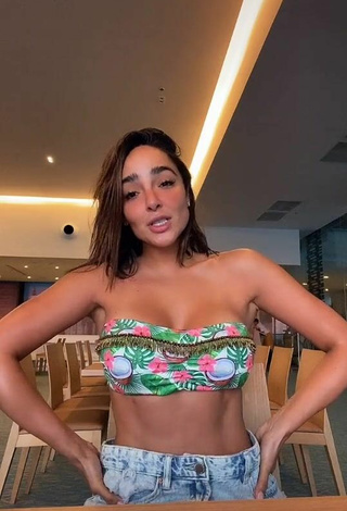 Sultry Manelyk González Shows Cleavage in Bikini Top