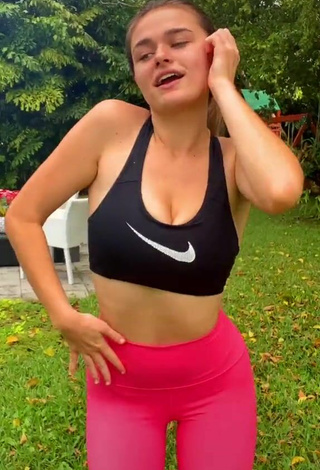 2. Sexy Megan Guthrie Shows Cleavage in Black Sport Bra