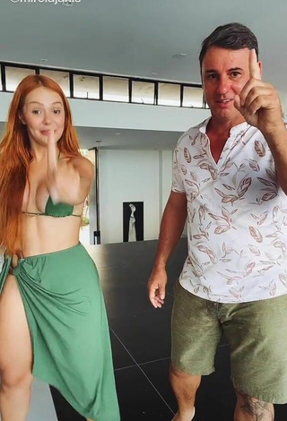 3. Sexy Mirela Janis Shows Cleavage in Green Bikini Top