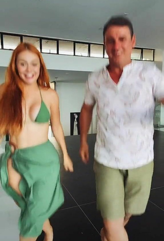 4. Sexy Mirela Janis Shows Cleavage in Green Bikini Top