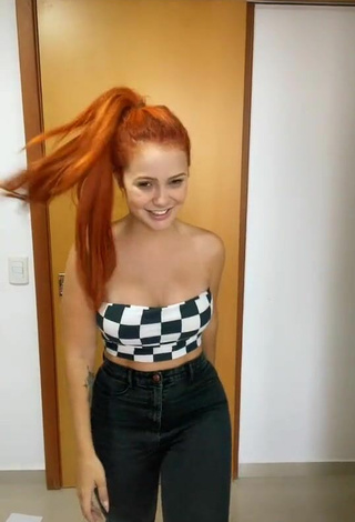 2. Sultry Mirela Janis Shows Cleavage in Checkered Tube Top