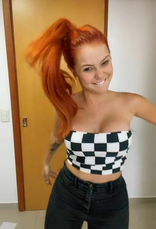 5. Sultry Mirela Janis Shows Cleavage in Checkered Tube Top