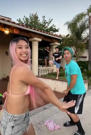 4. Sultry Michelle Chin in Pink Bikini Top (Underboob)