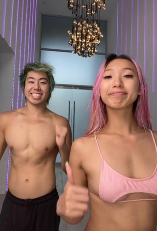 2. Sexy Michelle Chin in Pink Bikini Top (Underboob)