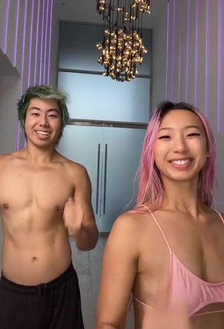 3. Sexy Michelle Chin in Pink Bikini Top (Underboob)