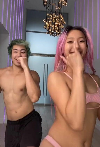 5. Sexy Michelle Chin in Pink Bikini Top (Underboob)