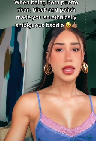 Sultry Eva Gutowski Shows Cleavage in Top