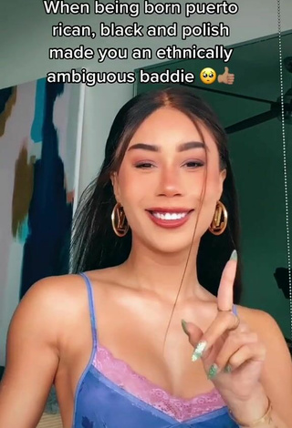 5. Sultry Eva Gutowski Shows Cleavage in Top