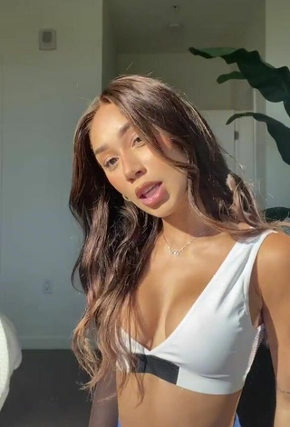 2. Sultry Eva Gutowski Shows Cleavage in White Sport Bra