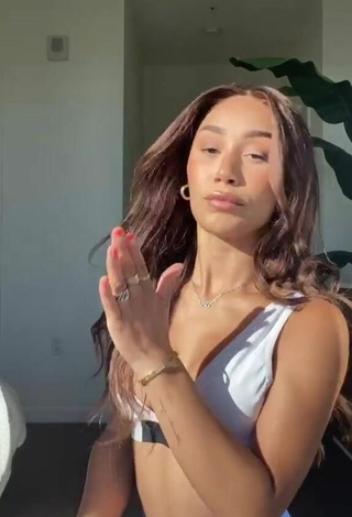 3. Sultry Eva Gutowski Shows Cleavage in White Sport Bra