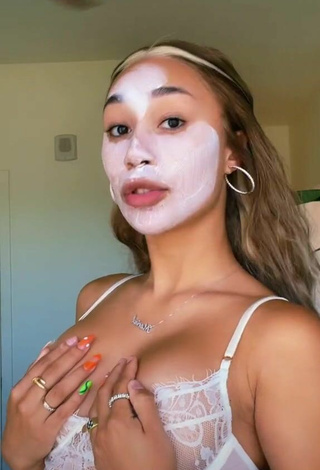 Sultry Eva Gutowski Shows Cleavage in White Bra