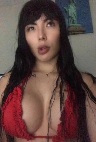 3. Hot Natalia Shows Cleavage in Red Bikini Top