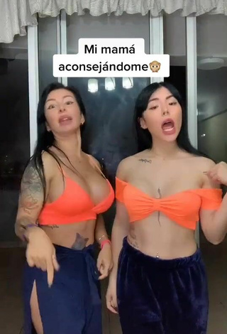 5. Cute Natalia Shows Cleavage in Orange Crop Top