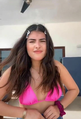 Titillating Nicole García in Pink Bikini Top