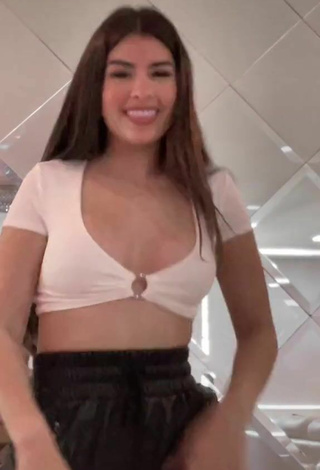 2. Luscious Nicole García in White Crop Top