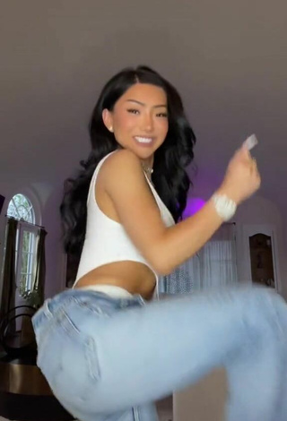 2. Sultry Nikita Dragun Shows Cleavage in White Bodysuit